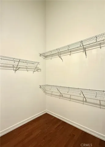 a view of a room with racks on the wall