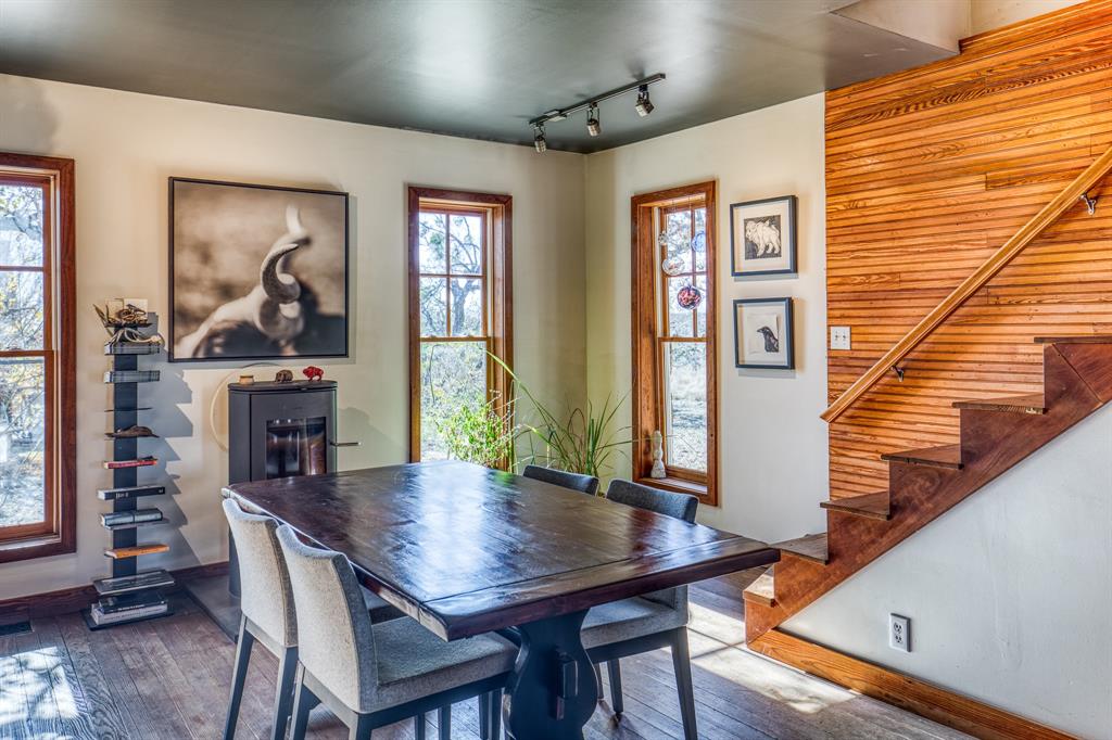 2969 County Lane Talpa, TX 76882 - Photo 11 of 40 a view of a dining room with furniture window and wooden floor