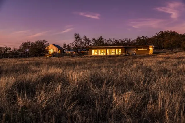 a view of a lake and sunset