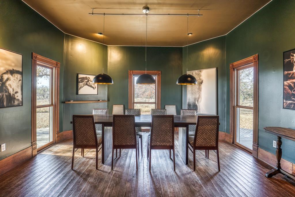 2969 County Lane Talpa, TX 76882 - Photo 10 of 40 a view of a dining room with furniture window and wooden floor
