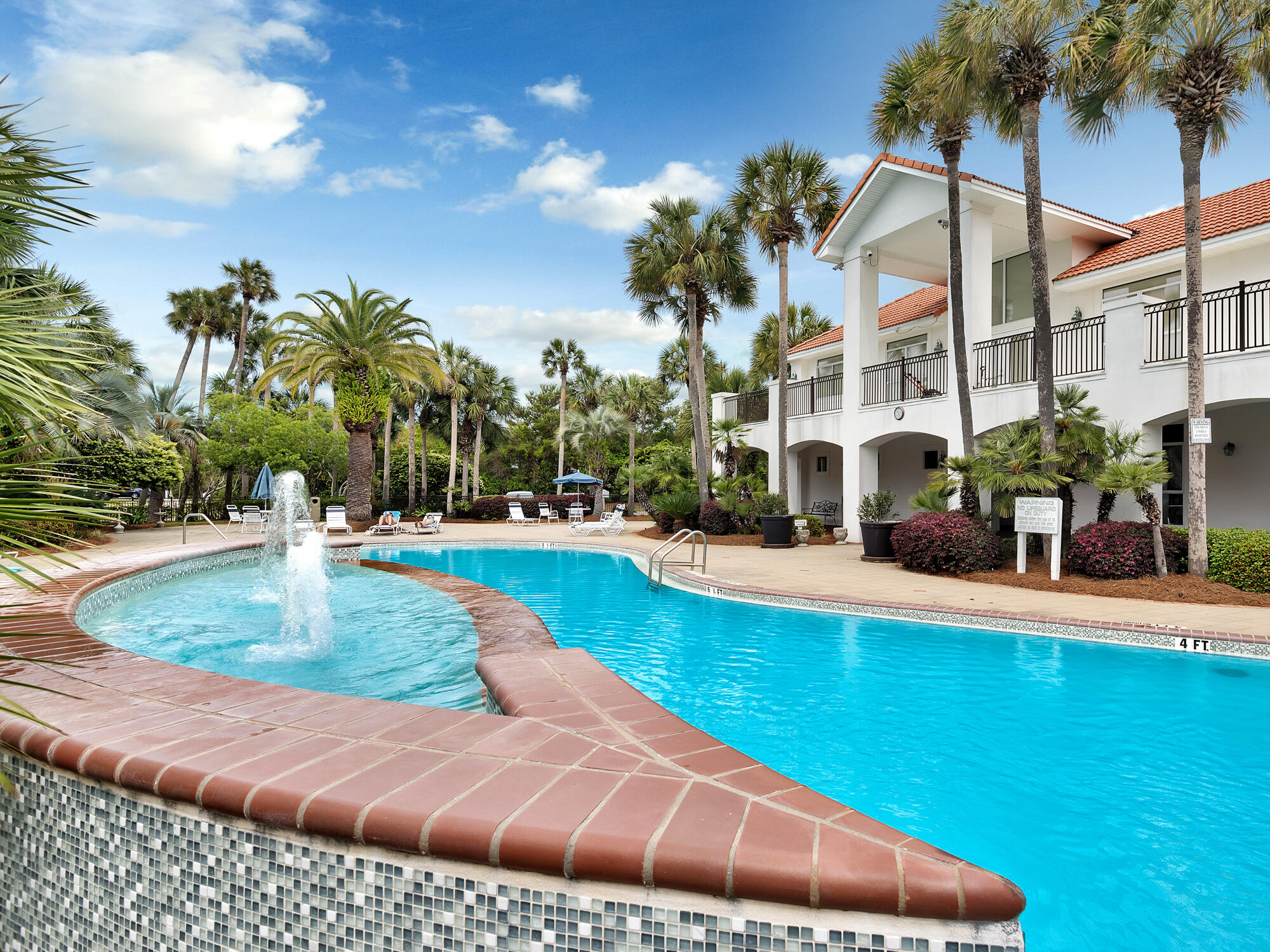 4626 Sunset Pointe Destin, FL 32541 - Photo 6 of 7 a swimming pool with outdoor seating and yard