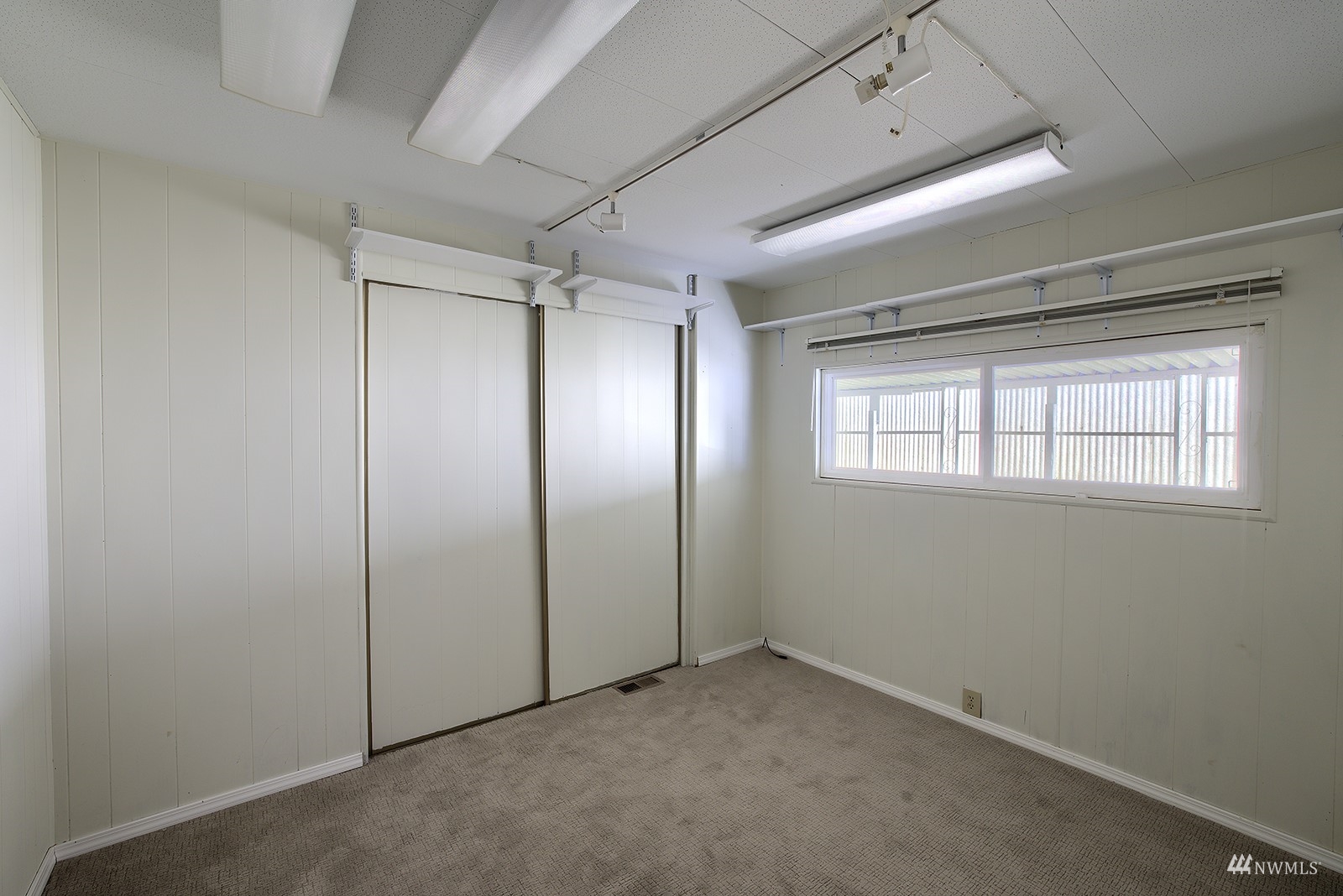 3408 206th Place Southeast Bothell, WA 98012 - Photo 10 of 26 an empty room with windows and closet