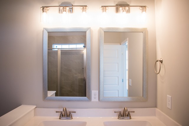 112 Cherry Fields Clarksville, TN 37042 - Photo 13 of 19 a bathroom with a sink and a mirror