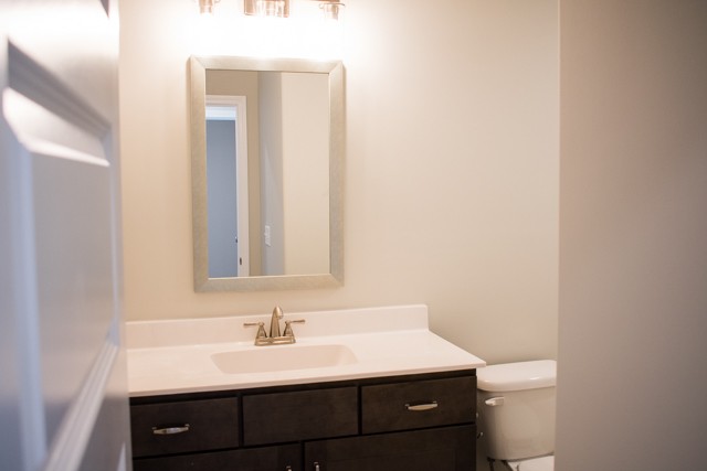 112 Cherry Fields Clarksville, TN 37042 - Photo 17 of 19 a bathroom with a sink and a mirror