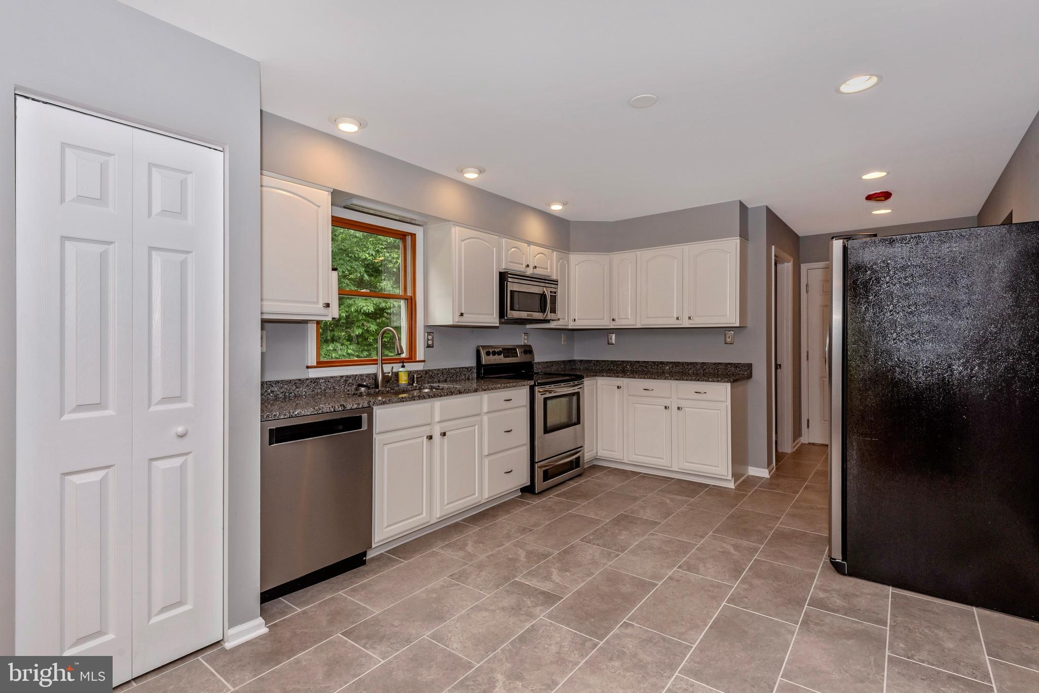 6803 Plantation Road Frederick, MD 21701 - Photo 13 of 38 Gourmet Kitchen w/ SS Appliances & Granite Counter