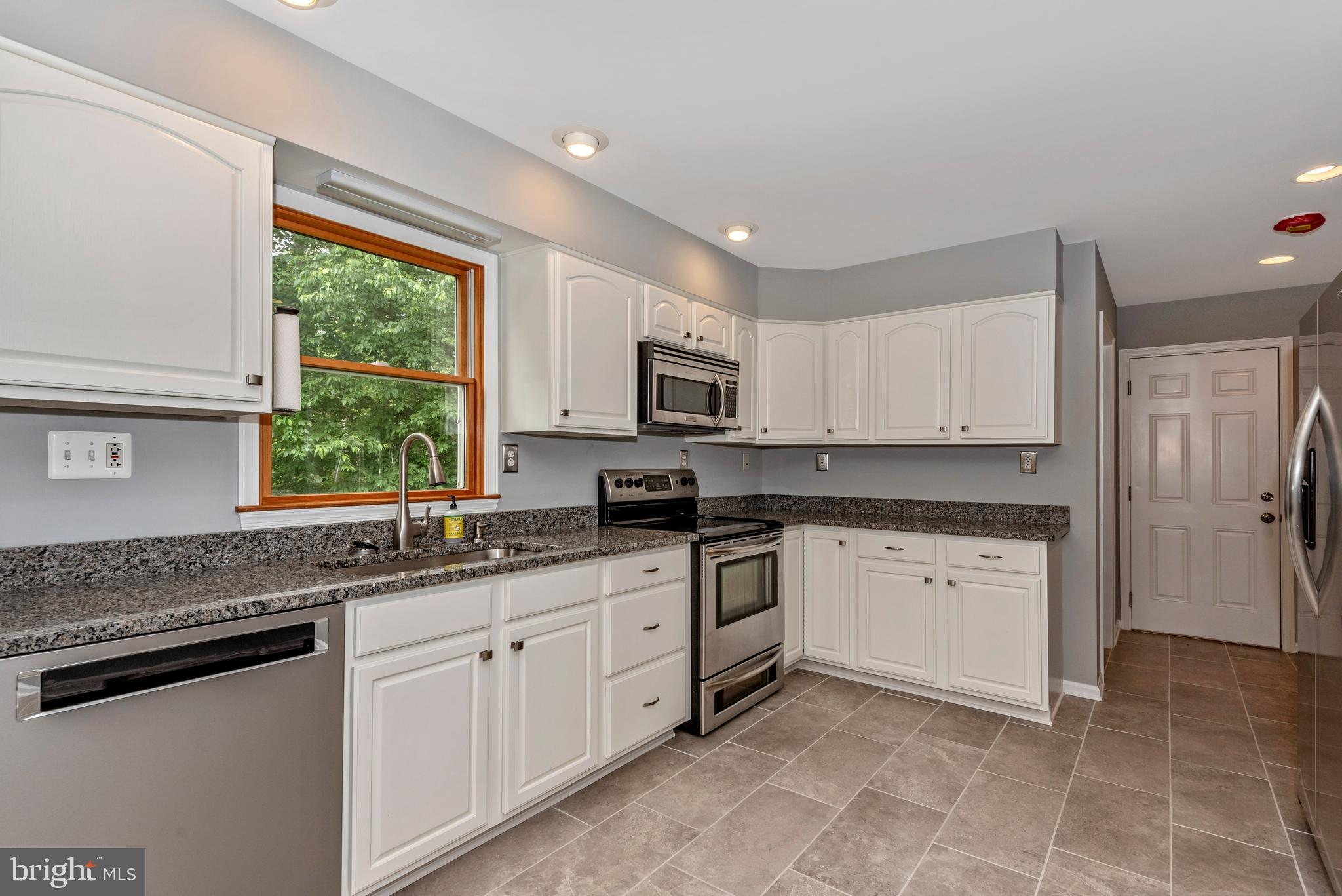 6803 Plantation Road Frederick, MD 21701 - Photo 14 of 38 Gourmet Kitchen w/ SS Appliances & Granite Counter