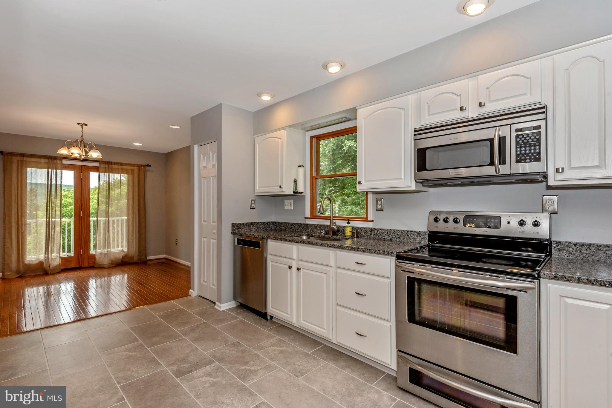 6803 Plantation Road Frederick, MD 21701 - Photo 16 of 38 Gourmet Kitchen w/ SS Appliances & Granite Counter