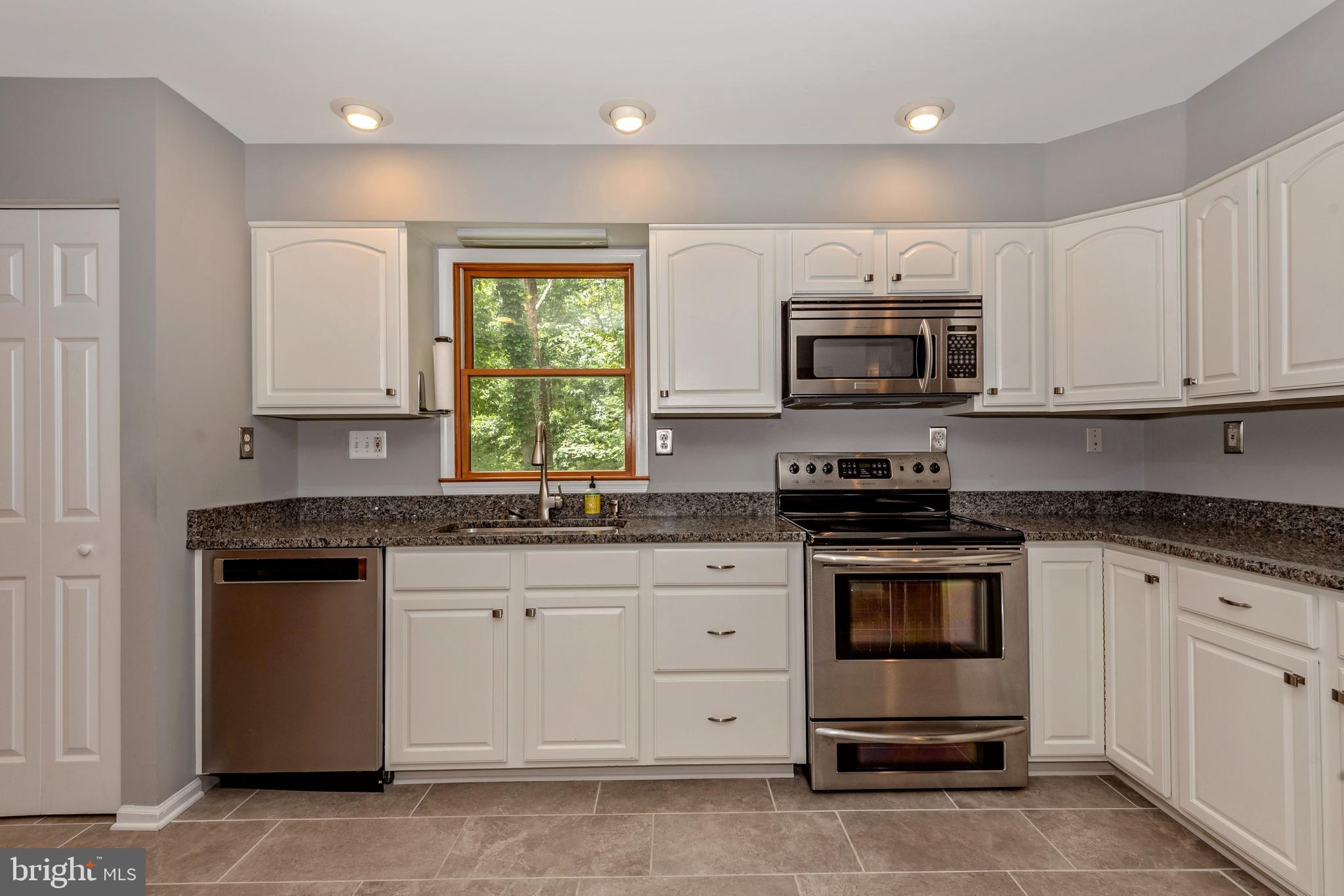6803 Plantation Road Frederick, MD 21701 - Photo 17 of 38 Gourmet Kitchen w/ SS Appliances & Granite Counter