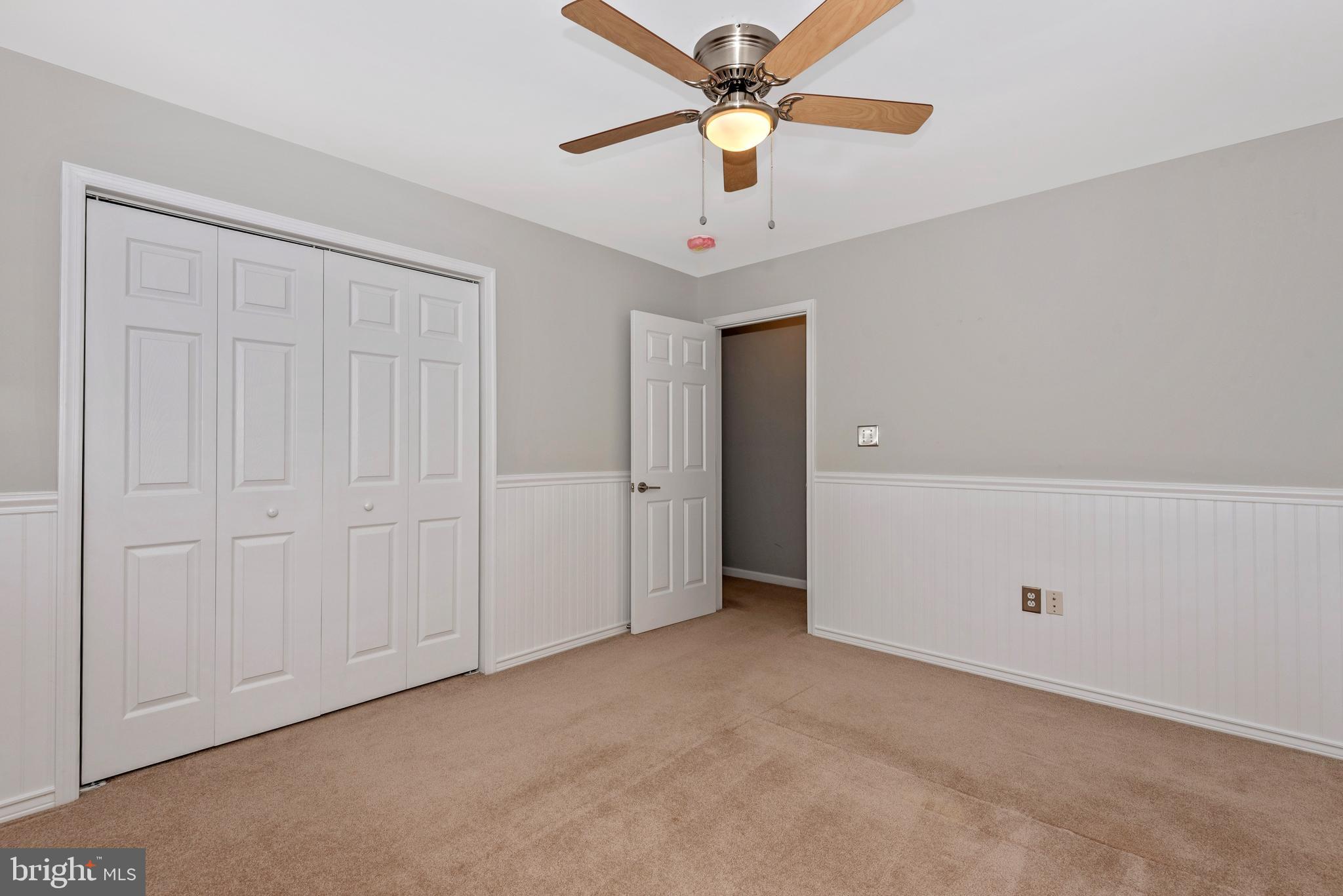 6803 Plantation Road Frederick, MD 21701 - Photo 26 of 38 Bedroom 3 w/ Wainscoting & Ceiling Fan