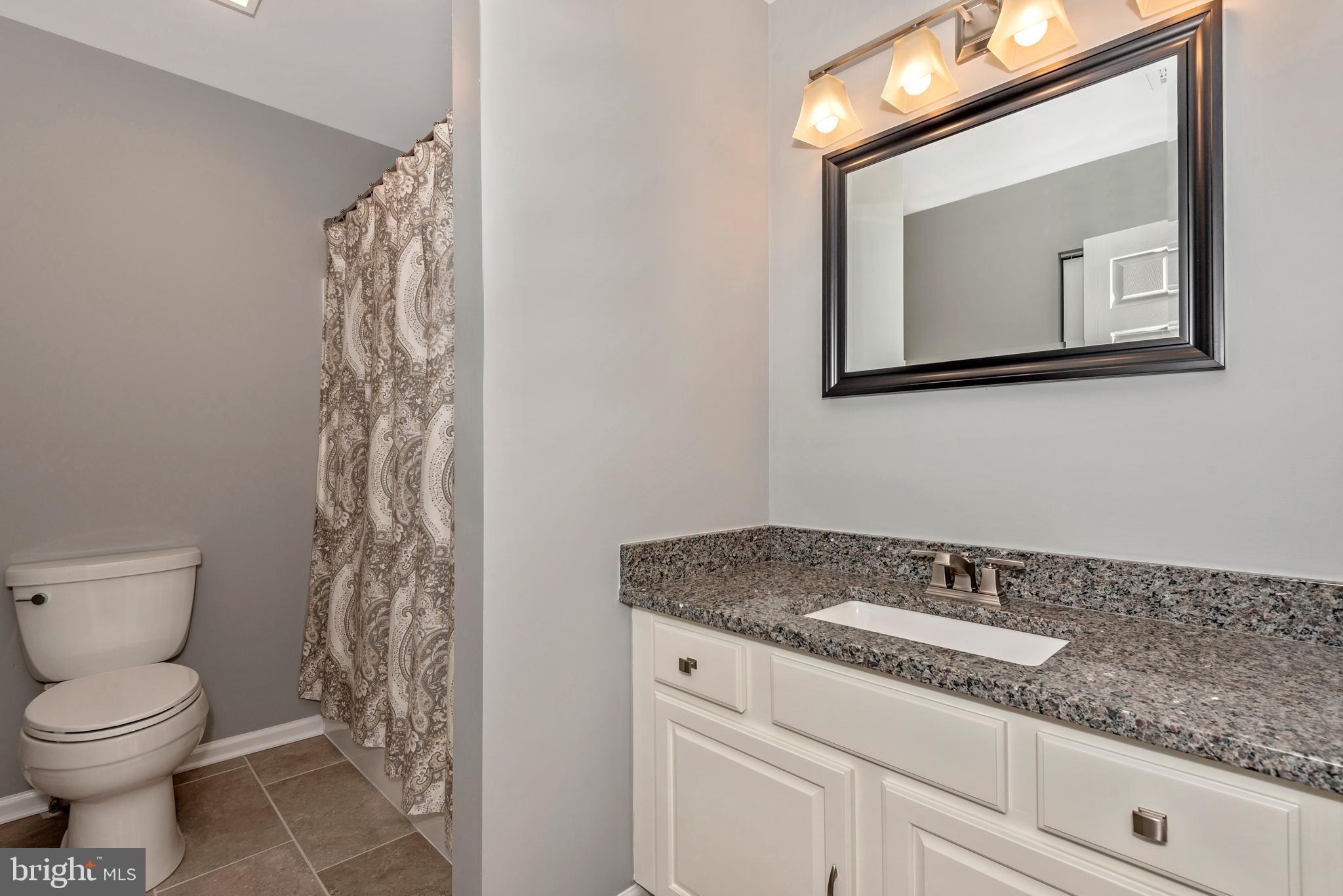 6803 Plantation Road Frederick, MD 21701 - Photo 27 of 38 Hall Bath w/ Granite Counters & New Toilet