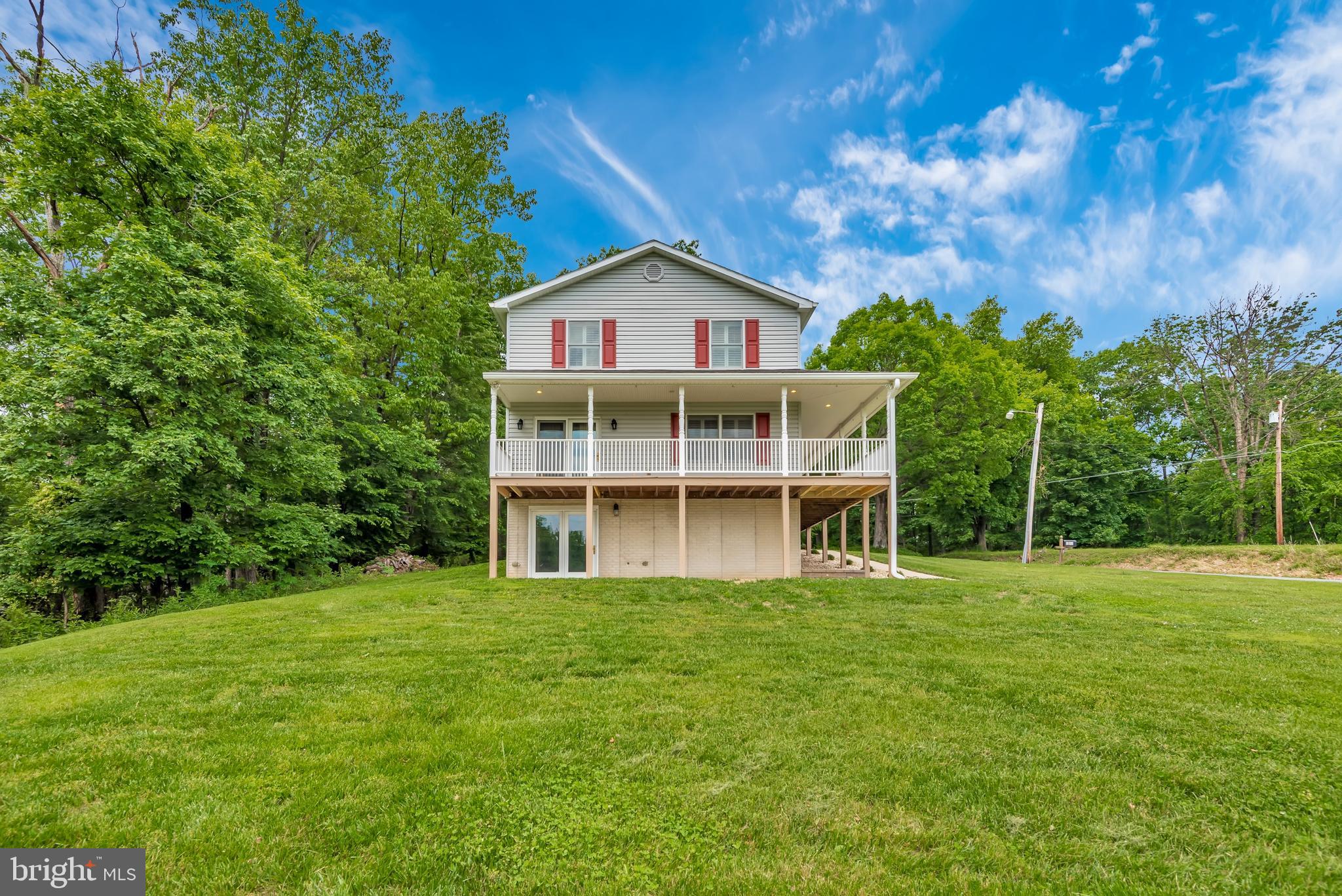 6803 Plantation Road Frederick, MD 21701 - Photo 32 of 38 Side of House & Patio