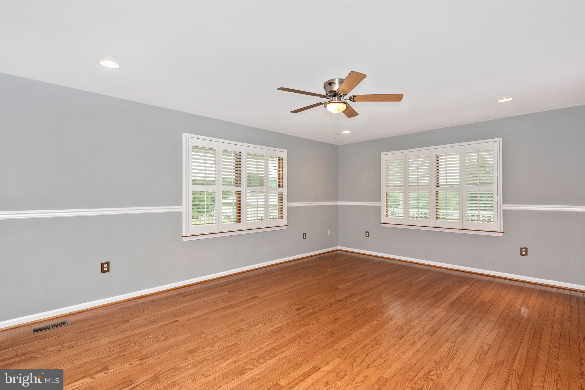 6803 Plantation Road Frederick, MD 21701 - Photo 7 of 38 Bright Living Room w/ Plantation Shutters