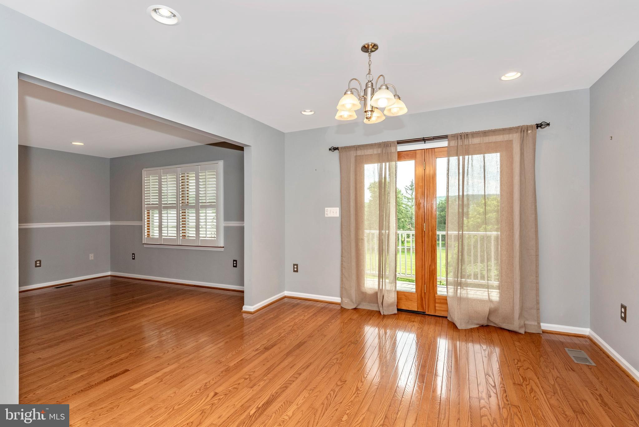 6803 Plantation Road Frederick, MD 21701 - Photo 10 of 38 Dining Room Leads to Wrap Around Porch