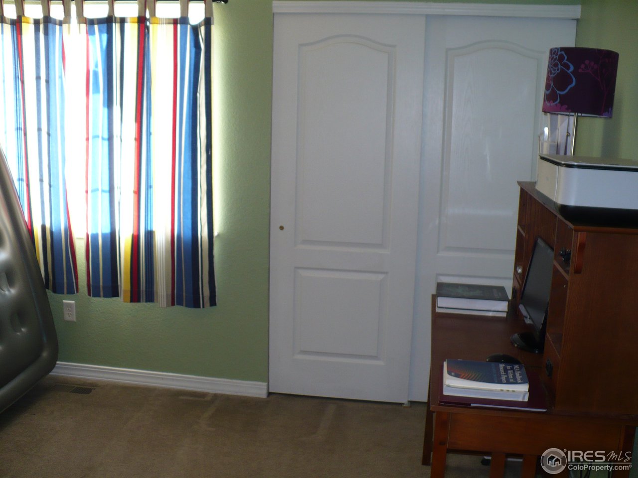 930 Button Rock Drive, Unit 80 Longmont, CO 80504 - Photo 11 of 19 Second Bedroom Upstairs