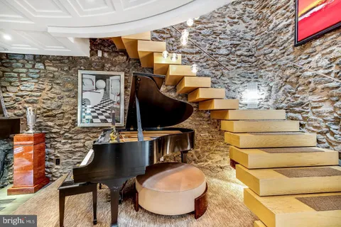 a outdoor living space with furniture and a fireplace