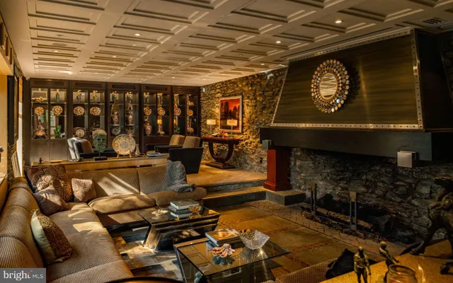 a bedroom with furniture and a flat screen tv