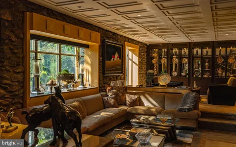 a kitchen with sink stove and refrigerator