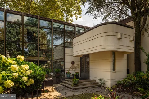 a outdoor living space with furniture and garden view