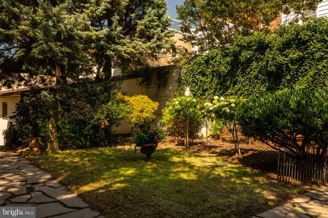 a view of a chairs and table in a patio