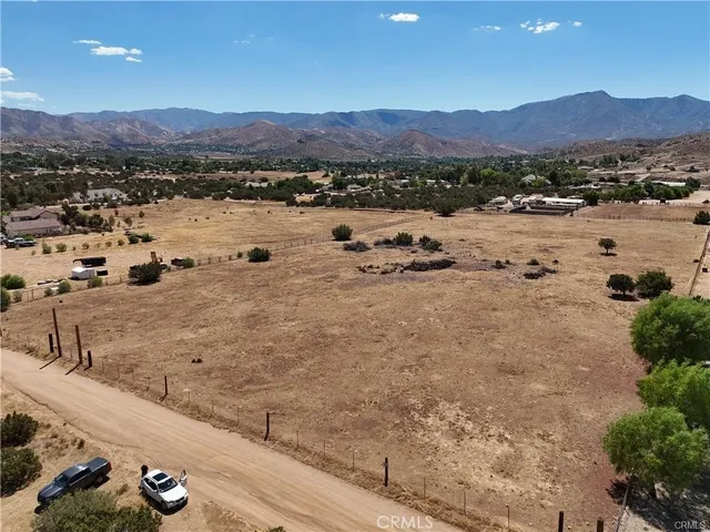 a view of a lake with mountains in the background