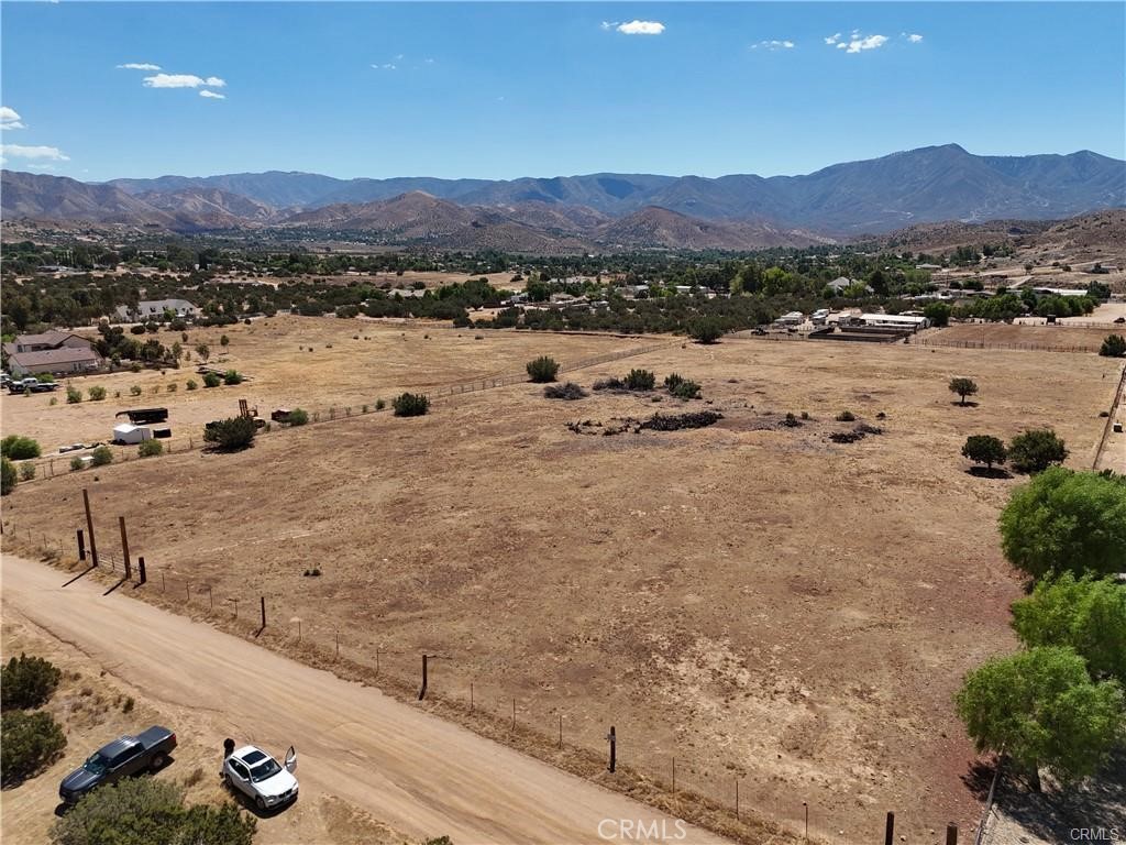 4320 Cedral Street Acton, CA 93510 - Photo 6 of 7 a view of a lake with mountains in the background