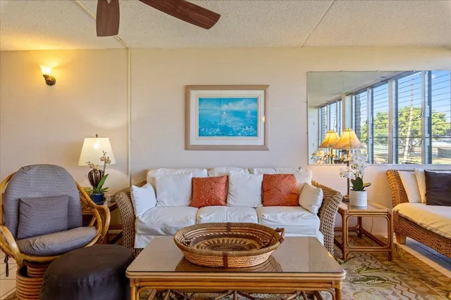 a living room with furniture and a window