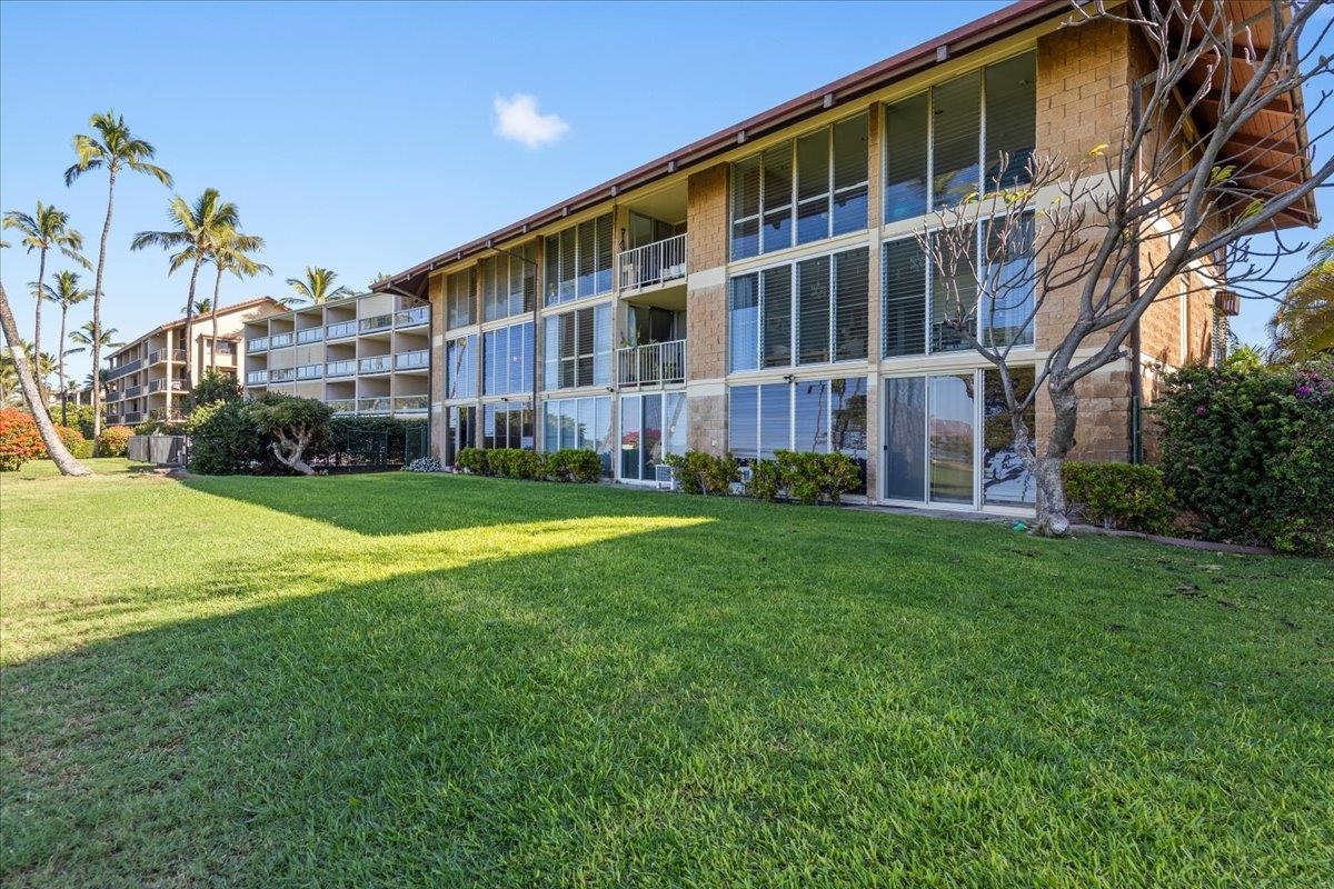 1002 South Kihei Road, Unit 212 Kihei, HI 96753 - Photo 26 of 50 a view of building with yard