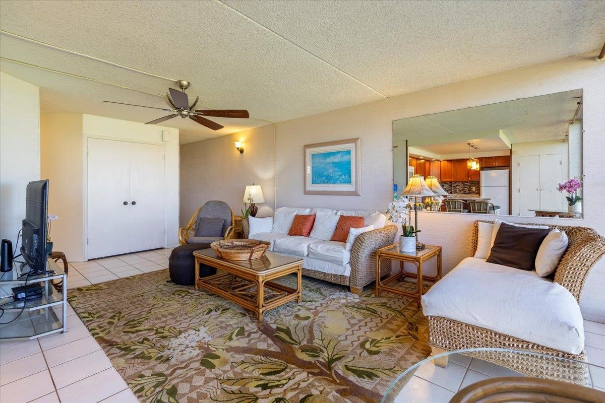 1002 South Kihei Road, Unit 212 Kihei, HI 96753 - Photo 27 of 50 a living room with furniture and a rug