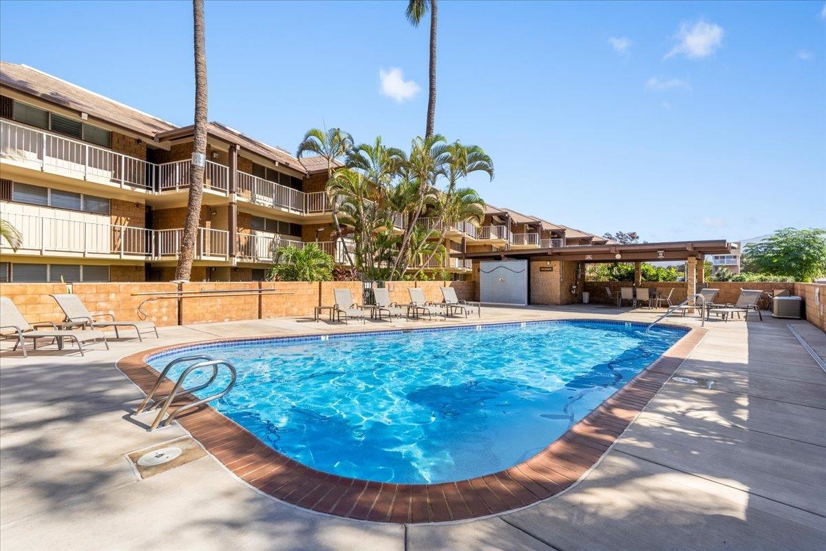 1002 South Kihei Road, Unit 212 Kihei, HI 96753 - Photo 28 of 50 a view of a swimming pool with a patio