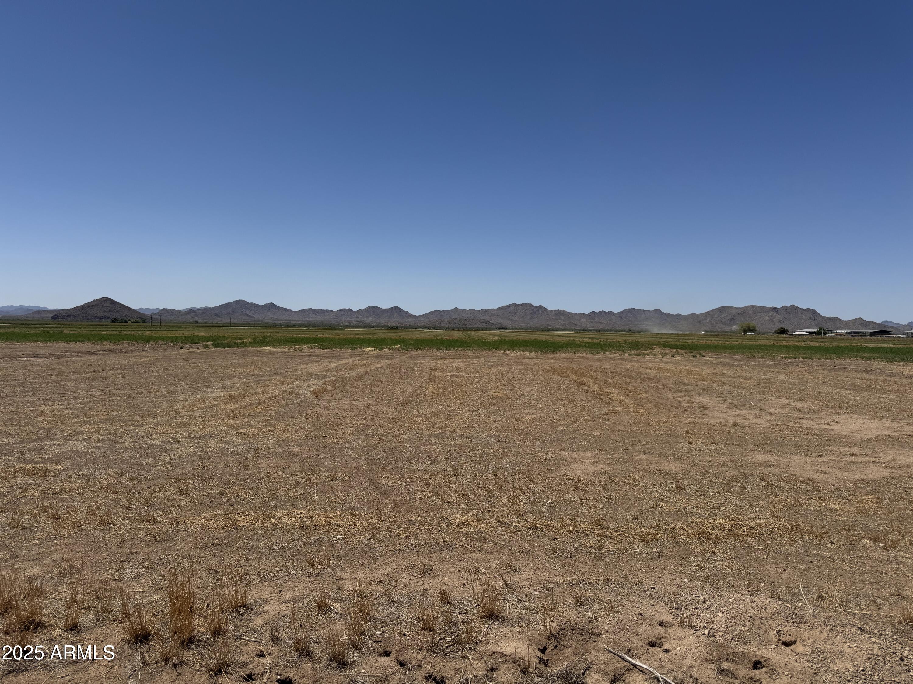 *** St - Az 85343 Palo Verde, AZ 85343 - Photo 10 of 11 a view of a lake with houses in the back