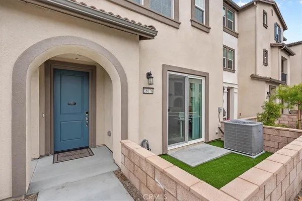 a house view with a garden space