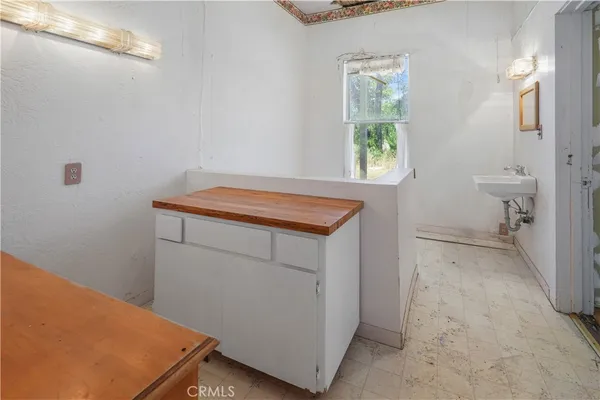 an aerial view of residential house with outdoor space