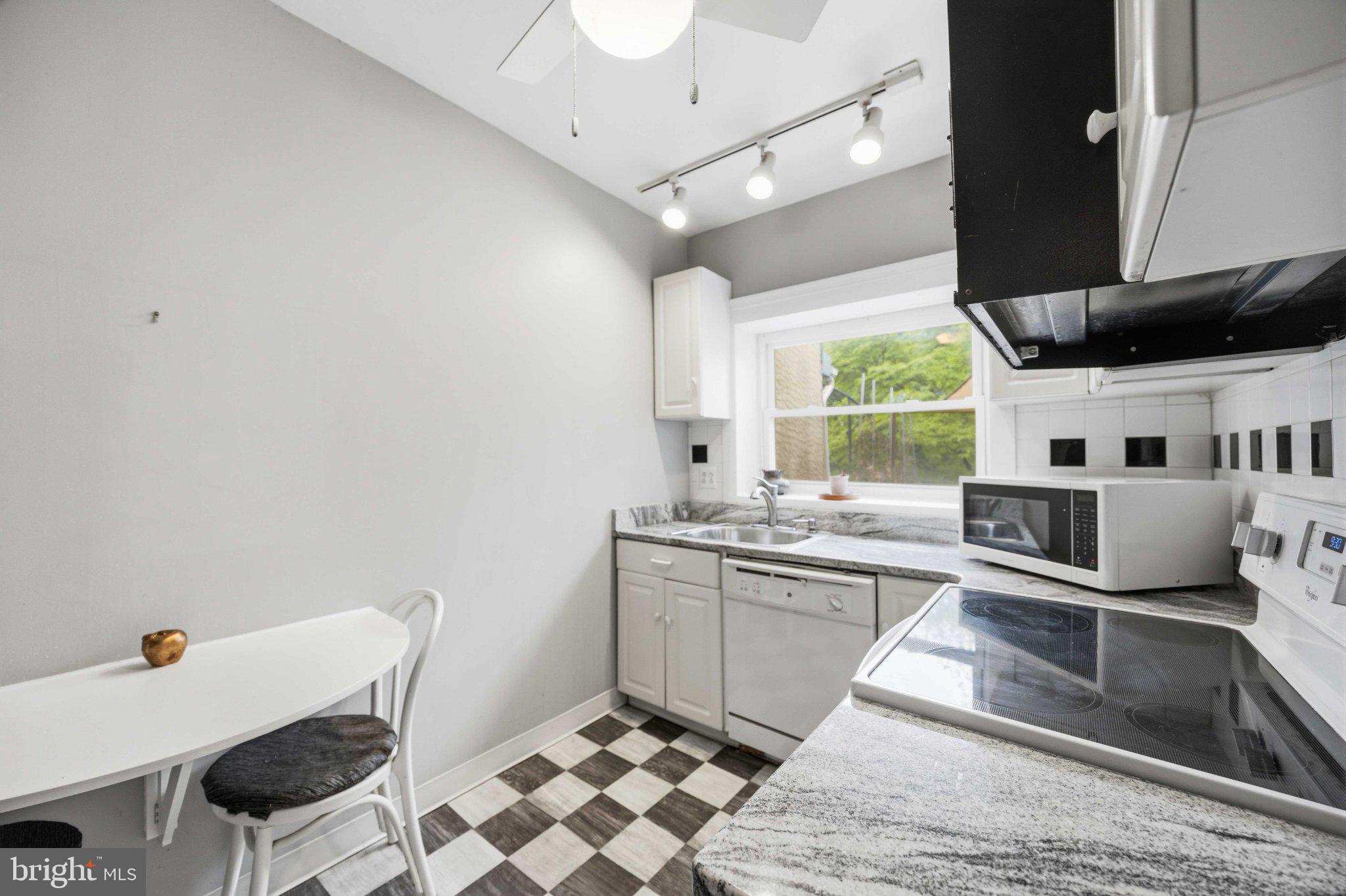 378 Church Road Elkins Park, PA 19027 - Photo 15 of 29 Charming kitchen with modern flair.
