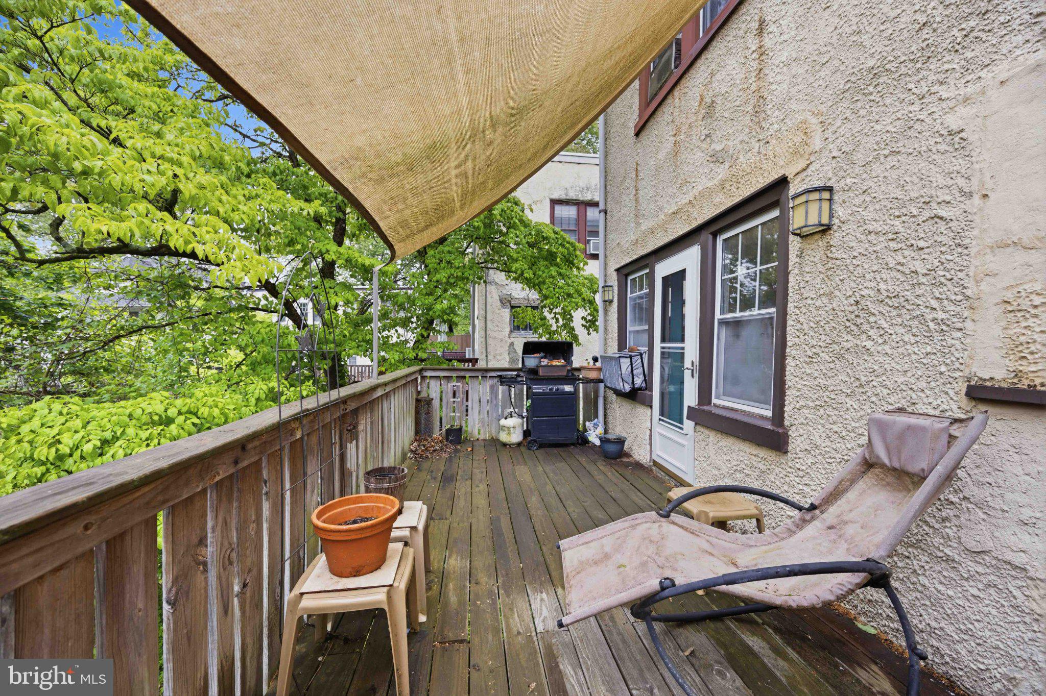 378 Church Road Elkins Park, PA 19027 - Photo 26 of 29 Charming deck with lush greenery