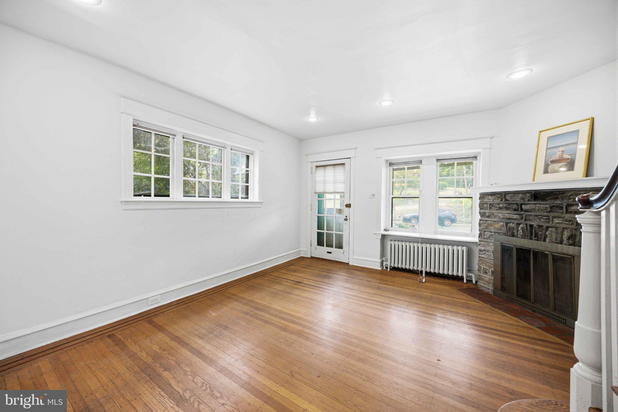 378 Church Road Elkins Park, PA 19027 - Photo 9 of 29 Bright and airy living space w/ fireplace