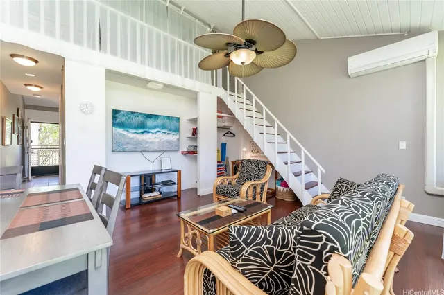 a bedroom with furniture and a chandelier