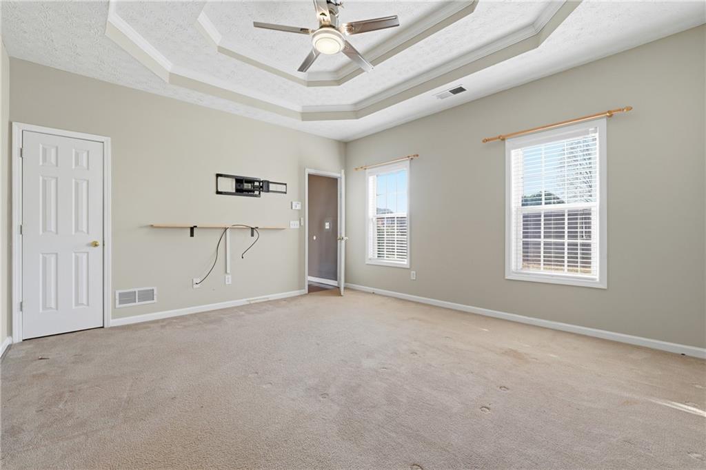 1402 Edgeley Way Lawrenceville, GA 30044 - Photo 15 of 23 a view of an empty room with a window