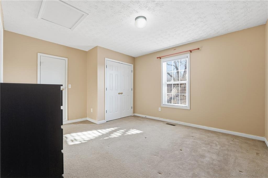1402 Edgeley Way Lawrenceville, GA 30044 - Photo 23 of 23 an empty room with windows