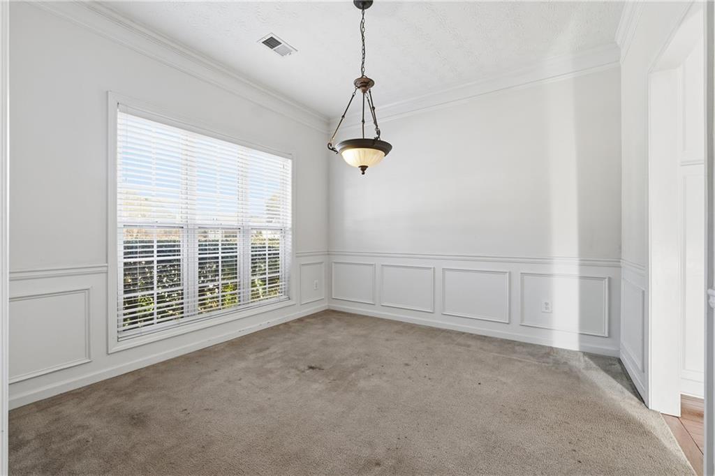 1402 Edgeley Way Lawrenceville, GA 30044 - Photo 4 of 23 a view of a room with windows and entryway