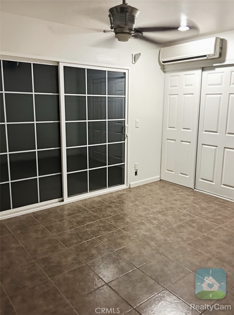 10270 Santa Cruz Road Desert Hot Springs, CA 92240 - Photo 4 of 8 a view of an empty room with a window