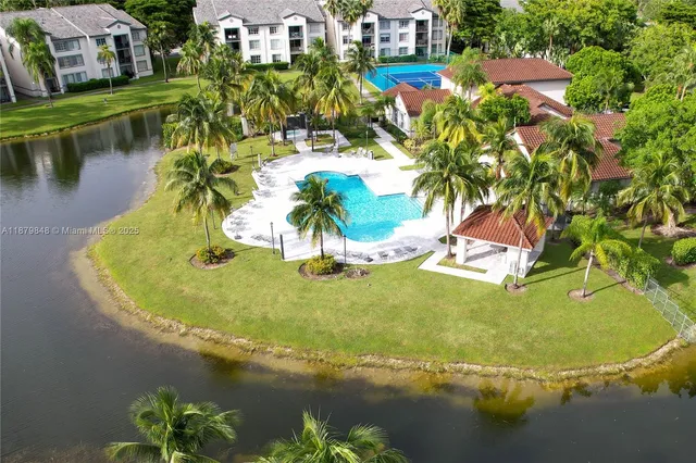 a view of a lake with a building in the background