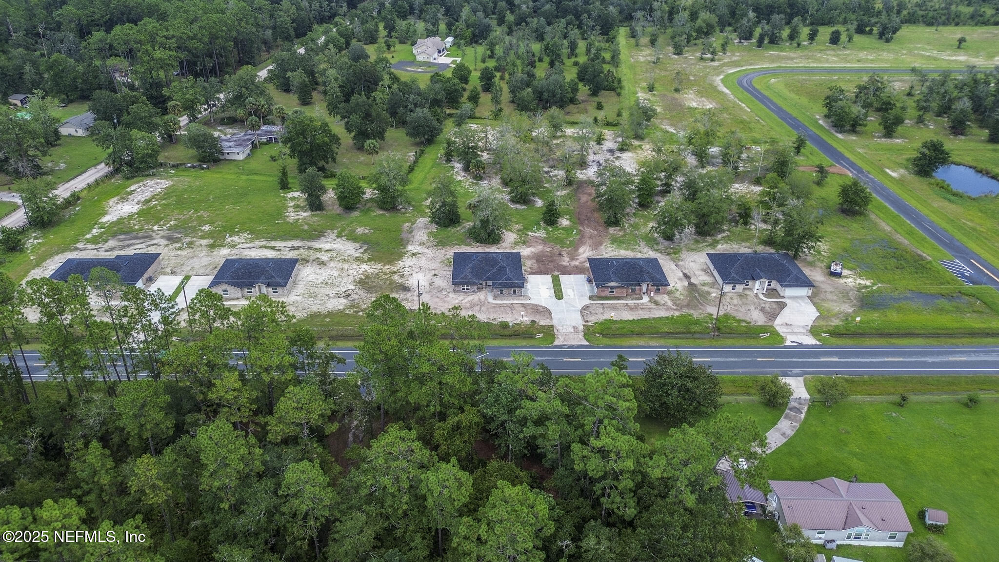 451624 Old Dixie Highway Callahan, FL 32011 - Photo 20 of 20 an aerial view of a house with outdoor space and street view