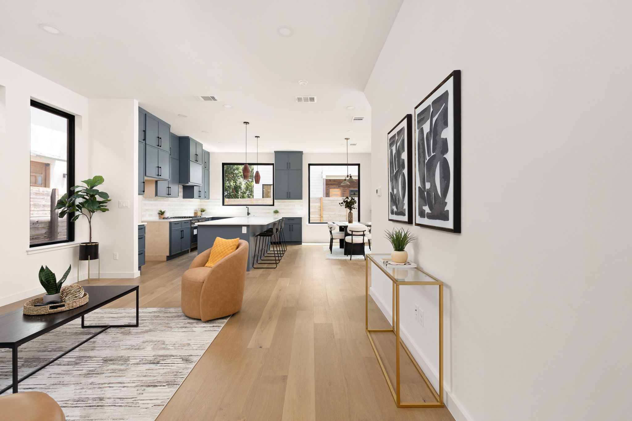 2717 Lyons Road, Unit 1 Austin, TX 78702 - Photo 12 of 40 An airy interior showcases light wood flooring and a modern, open-concept design.