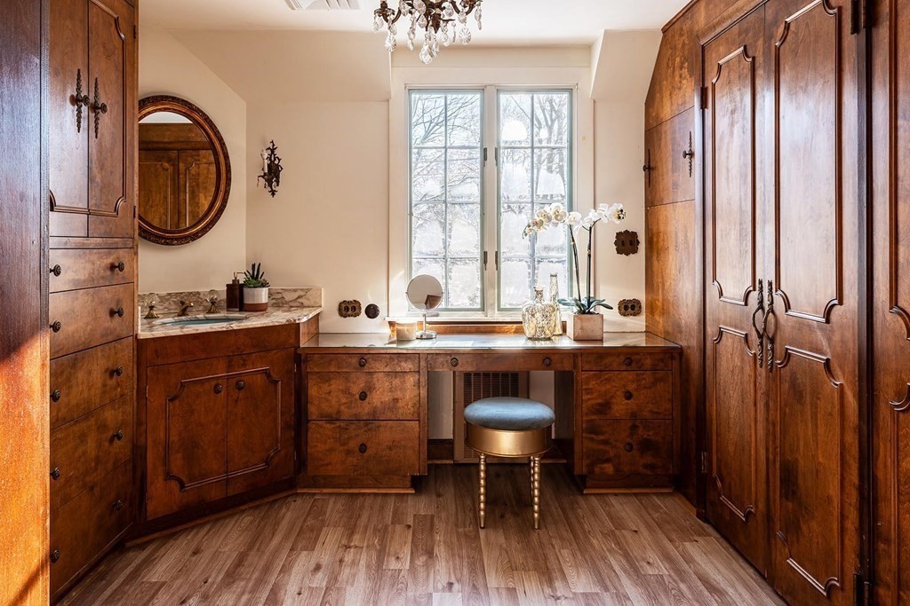 111 Hammondswood Road Newton, MA 02467 - Photo 11 of 15 a room with wooden floors and a sink