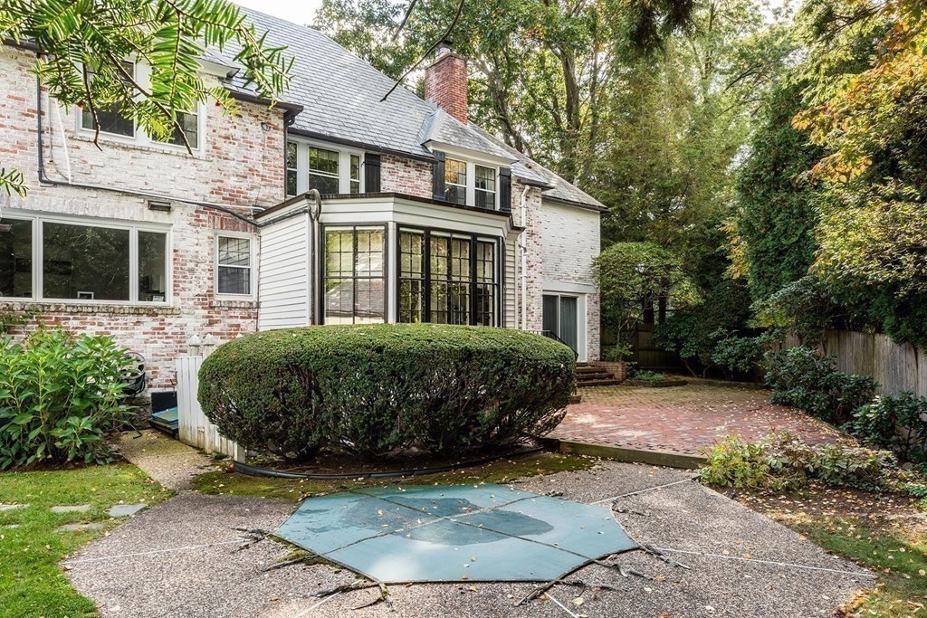 111 Hammondswood Road Newton, MA 02467 - Photo 12 of 15 a view of a house with a garden