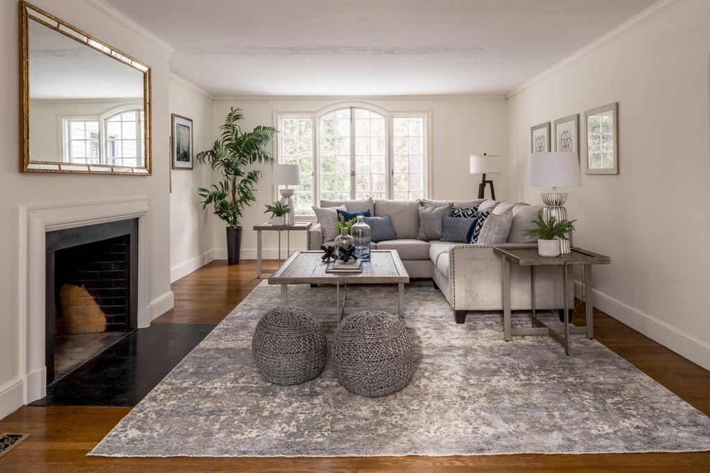 111 Hammondswood Road Newton, MA 02467 - Photo 3 of 15 a living room with furniture and a fireplace