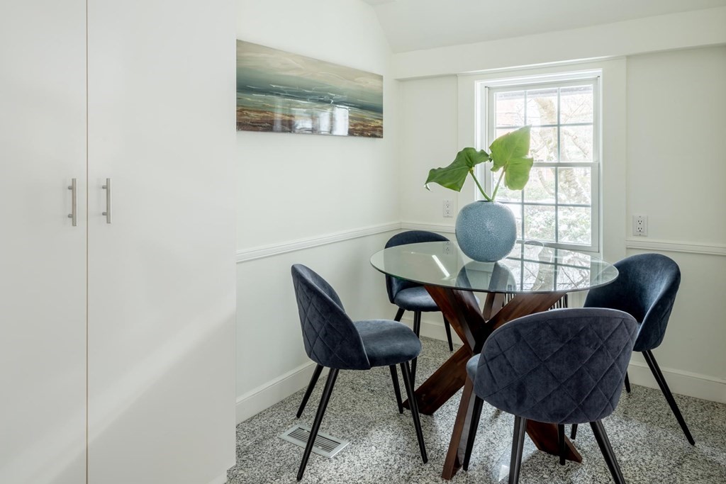 111 Hammondswood Road Newton, MA 02467 - Photo 7 of 15 a view of a dining room with furniture and wooden floor