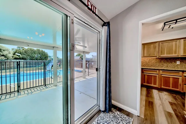 a view of a kitchen from the hallway