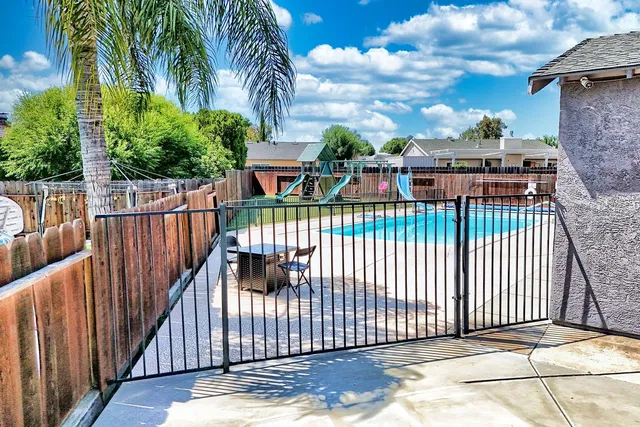 a view of a balcony with a pot