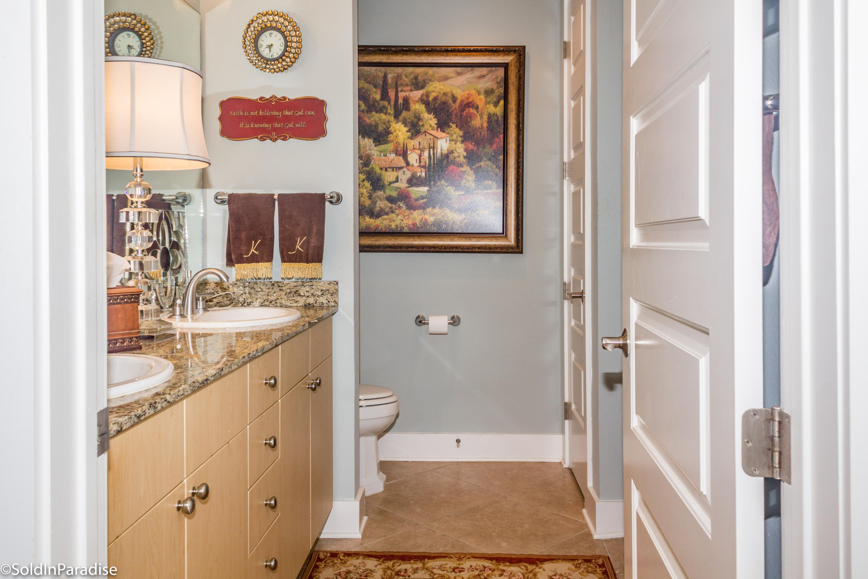211 Durango Road, Unit 316 Destin, FL 32541 - Photo 21 of 48 a bathroom with a sink and a mirror